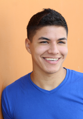 Young Hispanic man smiling