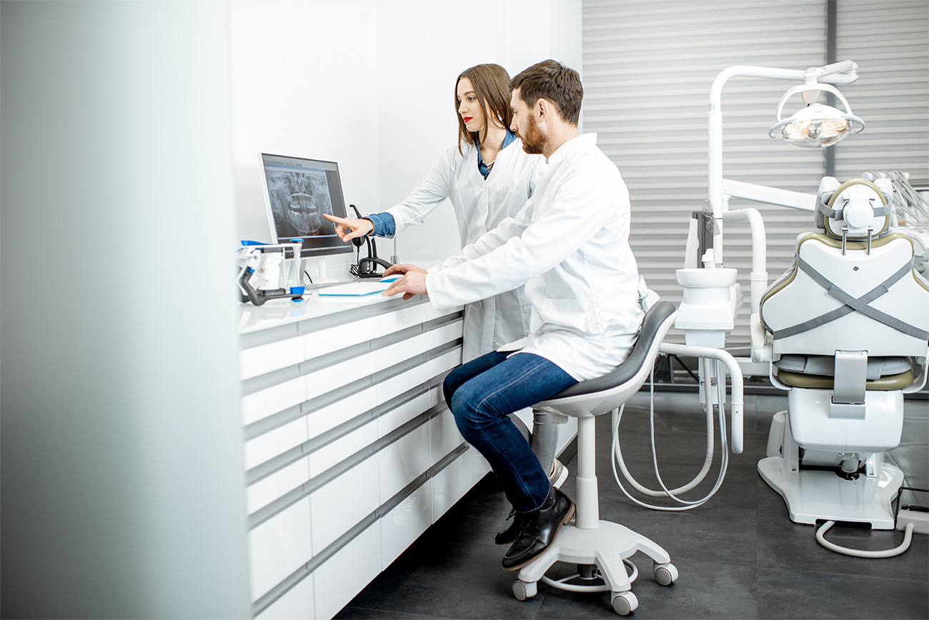 Patient discussing treatment with a dental professional