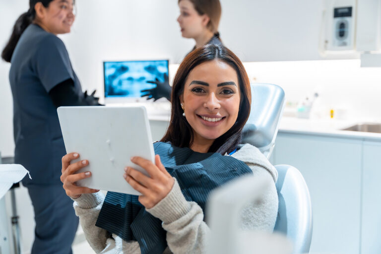 Patient and clinician discussing care with a tablet