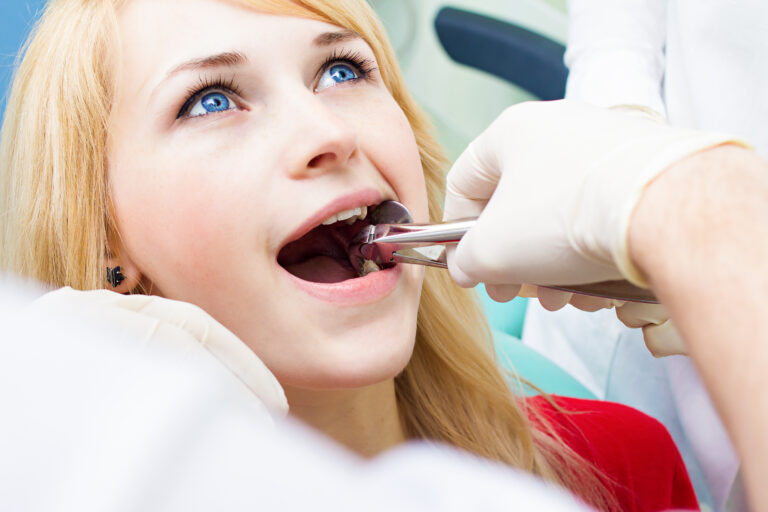 Child receiving a dental examination